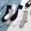 1616980169438.jpg Stockings Women's Tube Ins Tide Socks Street Autumn And Winter Black And White Long Socks Women's Solid Color Sports Custom Cotton Socks